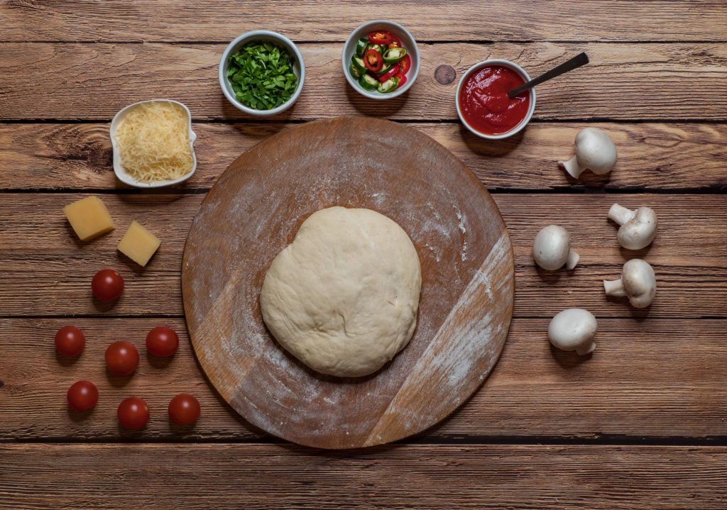 Rolling out the dough on a board