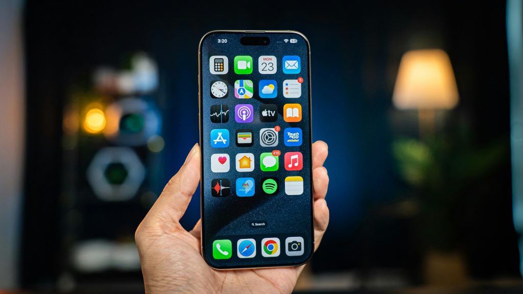 iPhone on minimalist desk setup showing modern smartphone technology, productivity tools, and daily digital workflow using Apple iOS system