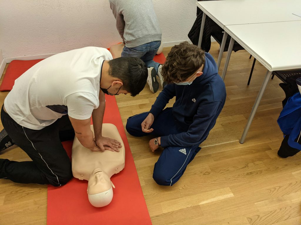 first aid for fainting CPR chest compressions technique