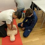 first aid for fainting CPR chest compressions technique