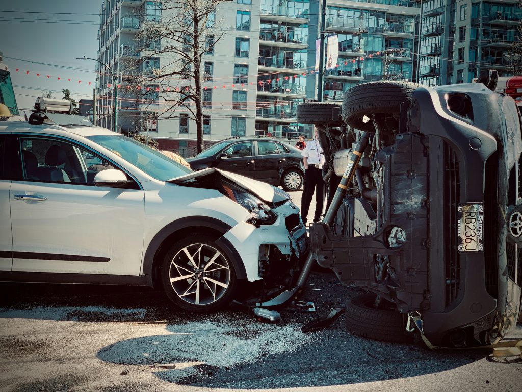 Traffic accident emergency response safety scene with minor car collision and roadside safety handling