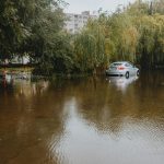 flood emergency evacuation flooded city street heavy rain disaster