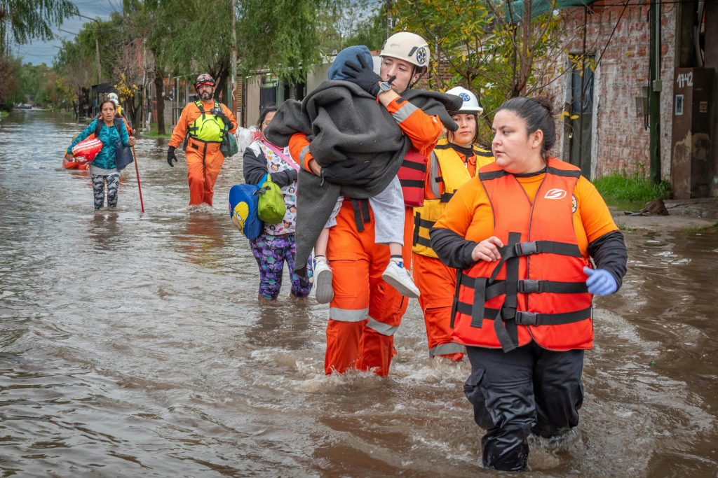 flood emergency evacuation people moving to higher ground safety